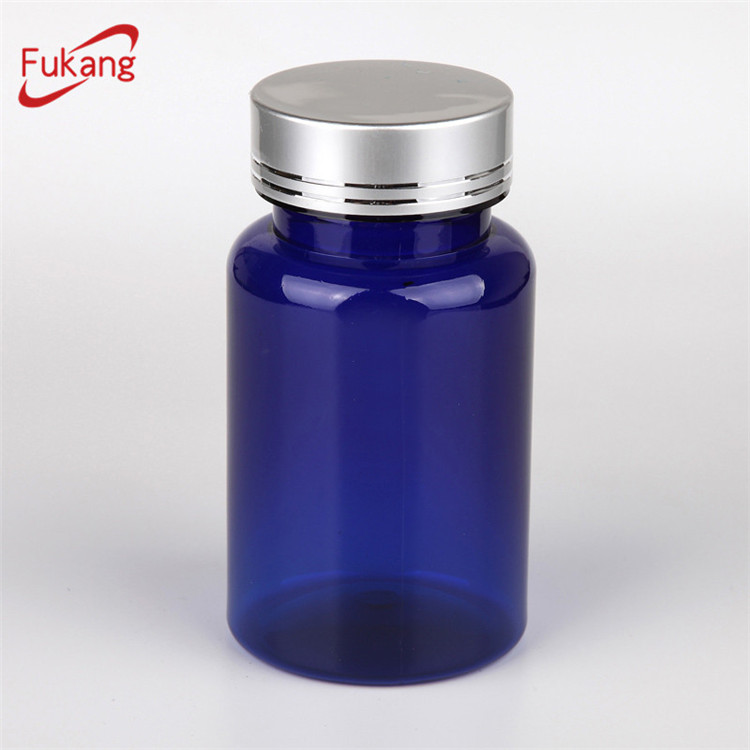 4 oz blue vitamin capsules bottle with silver aluminum lid hot sale to Pakistan