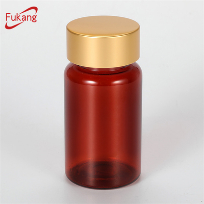 PET amber 75ml round plastic bottle with golden metal cap